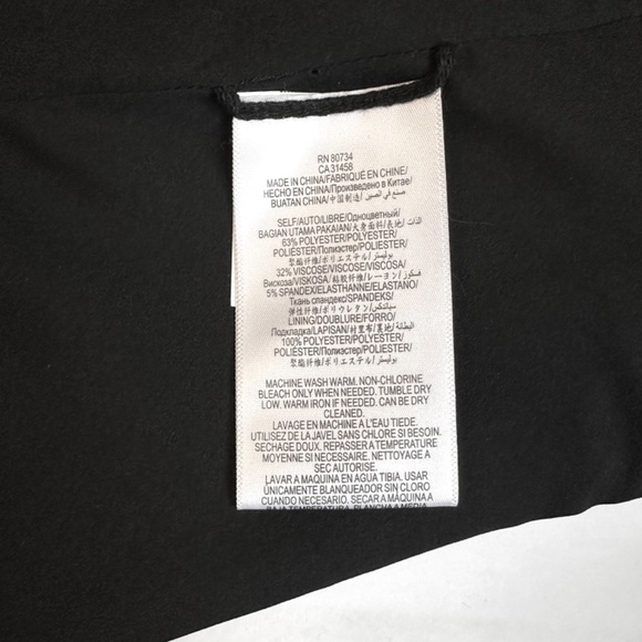 BCBG Maxazria Makenlee black cutout peplum top - Picture 13 of 14